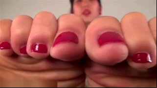 Teased by Asian girl showing off her big feet